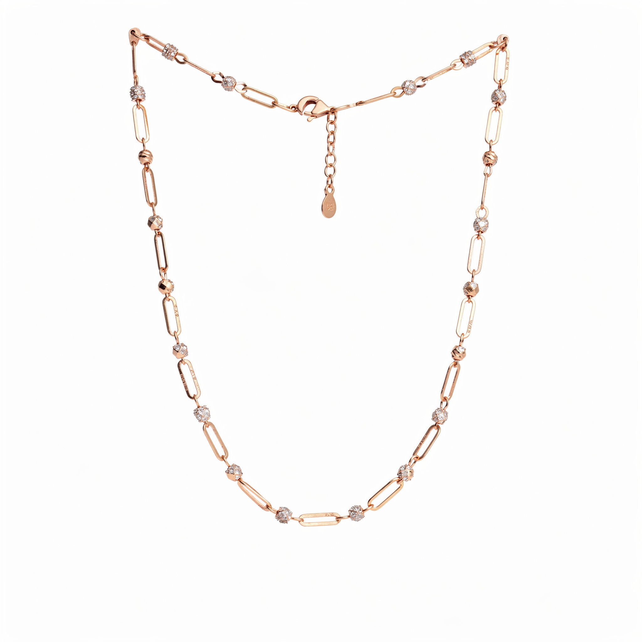 {
  "scene": "A professional jewelry studio shot featuring the rose gold necklace from image 2 suspended against the pristine, pure white seamless background from image 1.",
  "subjects": [
    {
    