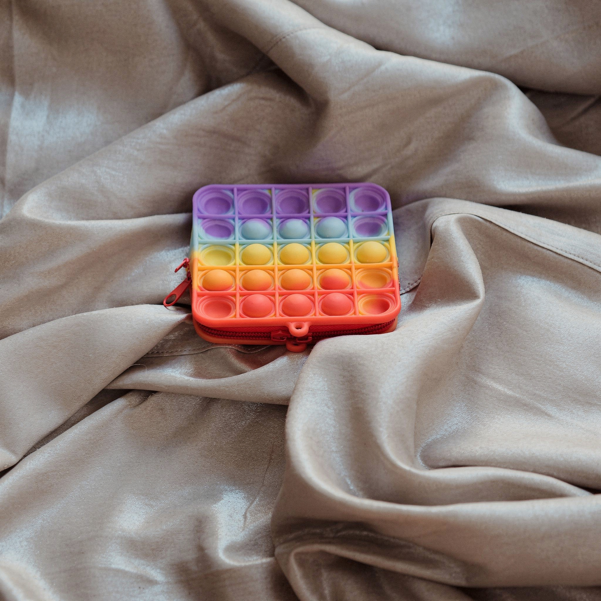 {
  "scene": "An elegant still-life composition set in the exact environment of image 1, but replacing the original items with the product from image 2 as the central subject. The background consists 