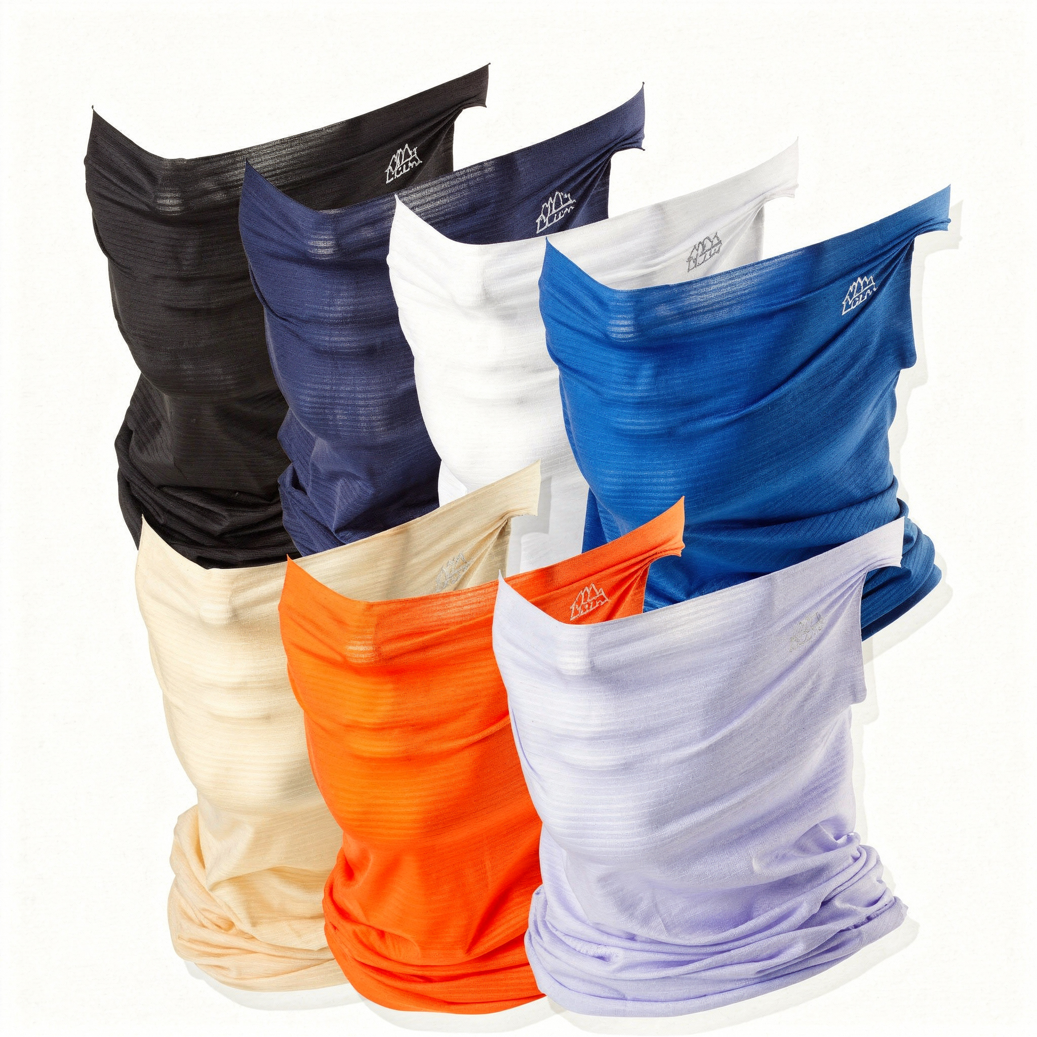 {
  "scene": "A pristine studio product photograph displaying a clustered arrangement of seven neck gaiters from image 1, positioned as if worn on invisible heads to show their shape, set against a se